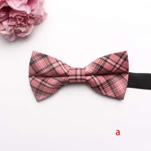 Pink plaid bow tie detail showing fabric texture and pattern, perfect shirt accessory.