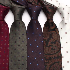 Detail view of men's jacquard woven ties featuring assorted paisley, polka dot and floral patterns.