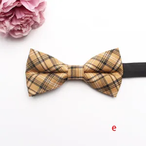 Classic plaid bow tie for men and women, stylish tartan neckwear with adjustable strap.