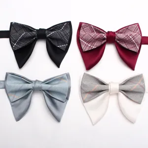 Detail shot of double layer horn bow tie with plaid pattern and solid satin fabric in multi colors.