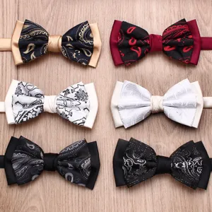 Men dual-color bow tie detail, classic paisley patterned wedding groom necktie accessory.