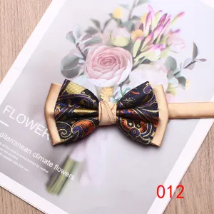 Men's double paisley bow tie with satin panel, elegant wedding and formal wear accessory.