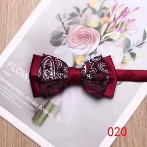 Wine red paisley bow tie for men, elegant satin spliced wedding groom fashion accessory.