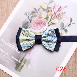 Stylish men's blue gold patterned color-blocked bow tie for wedding party formal wear.