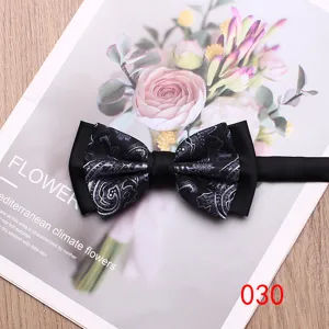 Classic black paisley bow tie for men, stylish wedding tuxedo bow tie apparel accessory.