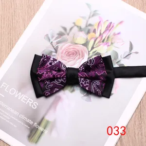 Men's two-tone paisley bow tie with black contrast for wedding party formal wear and events.