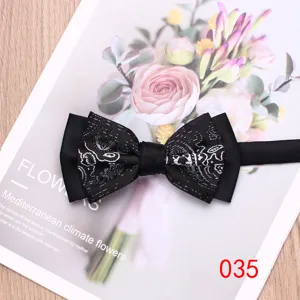 Black pattern bow tie for men, stylish two-tone wedding and party neckwear accessory.