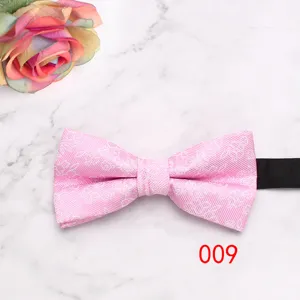 Detailed shot of a pink floral geometric men's formal business bow tie with a black strap.