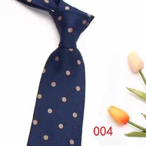 Classic blue polka dot necktie for men, elegant business formal necktie detail view.