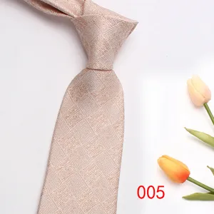 Classic men's necktie in elegant textured apricot design, ideal for business and formal wear.