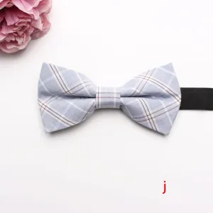 Detailed view of the light blue plaid bow tie, featuring classic check pattern and fine fabric.