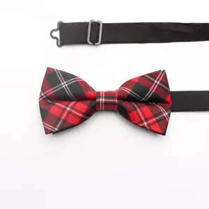 Red and black plaid bow tie detail shot, adjustable strap, casual shirt accessory.