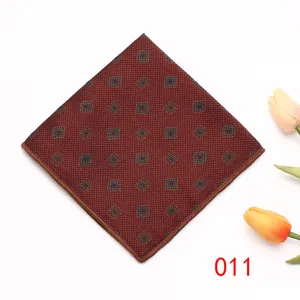 Mens red geometric pattern pocket square, elegant fabric suit handkerchief for business and weddings.