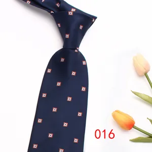 Men's navy blue silk business jacquard tie with geometric square pattern detail view.