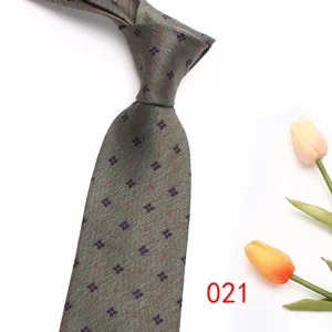 Men's grey floral jacquard tie, elegant business suit necktie for wedding and office wear.