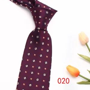 Classic burgundy men's tie featuring elegant geometric diamond patterns for business formal and wedding events.