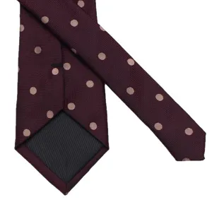 Classic burgundy polka dot men's tie with herringbone weave for business formal wear main view