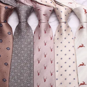 Close-up detail of stylish men's neckties set featuring assorted patterns and elegant fabric.