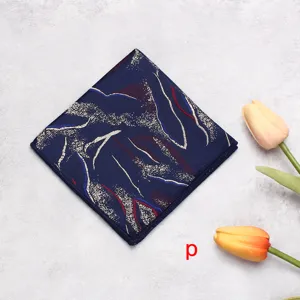Men's formal business suit pocket square handkerchief with abstract gold lines pattern.