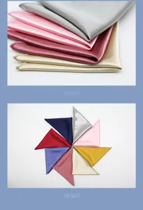 Detailopname van satijnen pochets voor heren in verschillende heldere kleuren en gladde textuur.