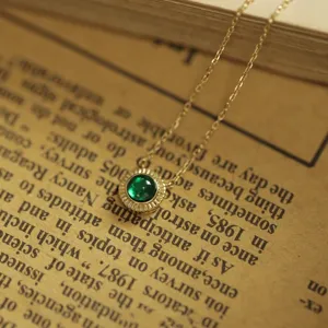S925 sterling silver 14K gold plated emerald necklace featuring a round green pendant