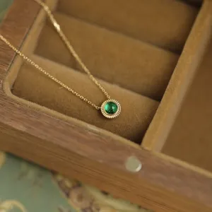 Elegant S925 sterling silver 14K gold plated necklace with round emerald pendant for women.