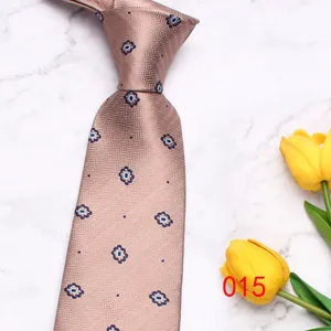 Men's stylish business tie featuring herringbone texture and floral motifs for weddings.