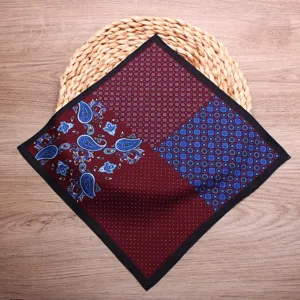 Detailed view of a stylish men's pocket square featuring a paisley and geometric print.