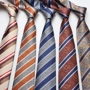 Classic men's necktie set with striped and paisley patterns, ideal for business and formal wear.