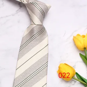 Detail view of men's stripe tie in light color, fine pattern design for business wear.