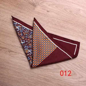Detailed shot of a printed silk pocket square with paisley and geometric patterns, ideal accessory.