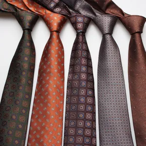 Classic men's business casual tie set featuring elegant vintage medallion and dot patterns.