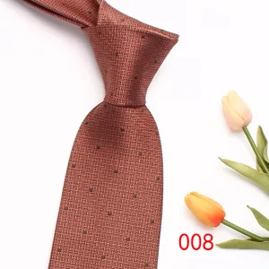 Detailed close-up view of a classic brown patterned business necktie with delicate texture.