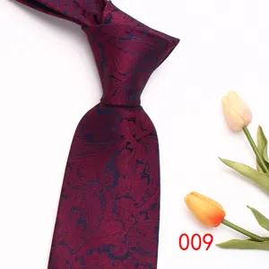 Men's business fashion paisley necktie in deep red, elegant handcrafted formal tie design.