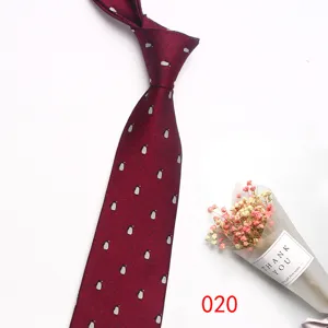Men formal business necktie featuring cute penguin pattern in dark red color for wedding wear.