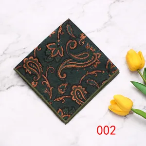 Taschino da uomo verde scuro con elegante motivo cachemire arancione per abiti formali.
