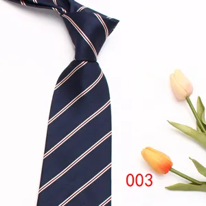 Detailed view of dark blue striped men's business necktie with elegant white diagonal lines.