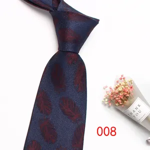 Detailed view of an 8cm men's business jacquard tie with vintage feather pattern in blue.