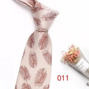 Detailed view of men's business retro tie featuring elegant jacquard feather pattern in soft tone.