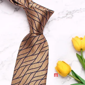 Men's business formal brown patterned necktie with stylish floral leaf design detail shot