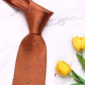 Detail view of mens business formal polyester silk necktie featuring elegant print patterns.