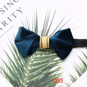 Blue velvet bow tie for men suit shirt, elegant pointed design with gold band accent for formal wear.