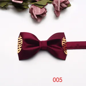 Burgundy wedding bow tie with gold double happiness symbol detail for groom and formal suits.