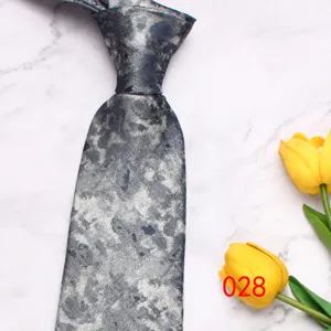 Classic men's silver patterned business casual necktie with elegant texture for wedding.
