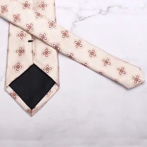 Classic men's light-colored patterned tie, elegant floral design for business and formal wear.