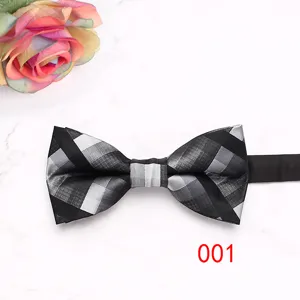 Classic black and white plaid men's bowtie detail, perfect for business and wedding suits.
