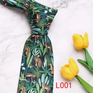 Men's printed necktie featuring a stylish jungle cheetah pattern on green fabric, elegant detail.