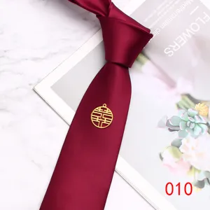 Burgundy wedding necktie detail, silk fabric men business tie with auspicious double xi charm.