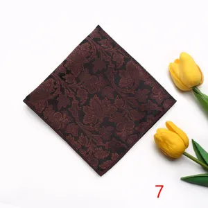 Detailed view of stylish men brown floral jacquard pocket square suit handkerchief accessory.