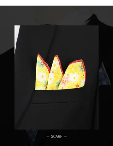 Pañuelo de bolsillo para hombre en algodón con flores amarillas, detalle elegante.